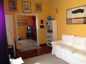 Living room into TV/family room from the end of the entrance hallway