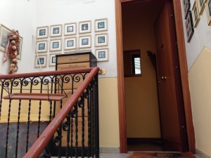 Entrance to our abode. The ceiling/roof is actually a translucent plastic-keeps out rain but lets in lots of sun and light.