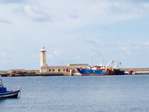 Lighthouse and harbor in Marsala, Sicily