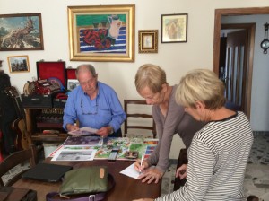 Fran and Connie go oaver photos and take down family history with Adolpho Ambrosini in his very nice home in Monteferrante