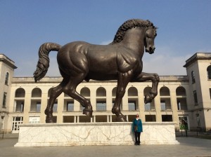 Close-up view of Leonardo’ da Vnci’s horse, the largest equestrian monument in the world, at the Ippodrome race track, with Fran serving to provide perspective to its size. 