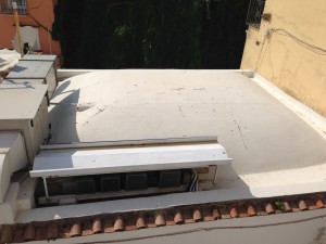 Roofs in Positano include mounds of sand, covered with something like a tarp or canvas and painted white in the summer months to reflect heat; black in winter to absorb the warmth of the sun