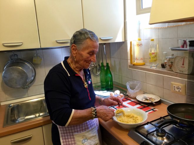 Maria shows Fran how to make porchetti 