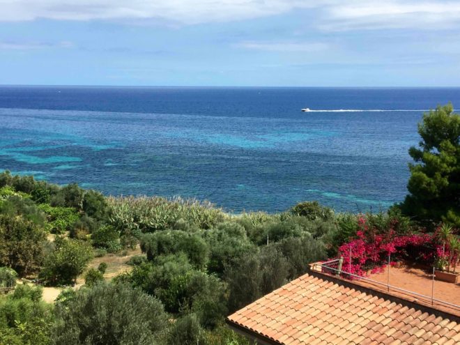 Rotating to the right, the view from our balcony out to sea. Check out the water - thought we might be in the Caribbean.