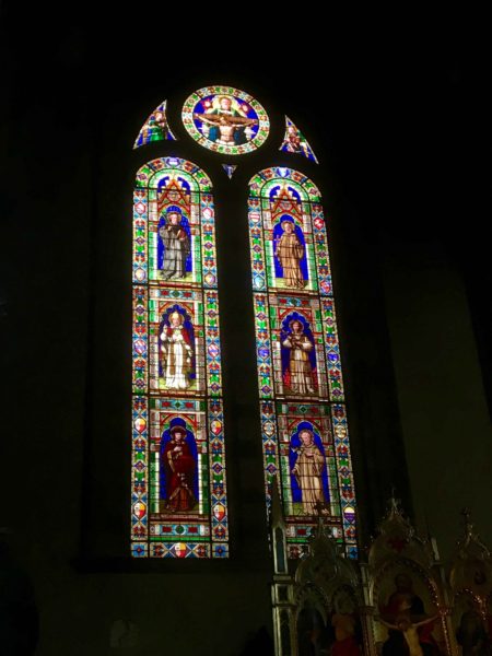 Okay, we snapped two photos, this one of the stained glass behind the alter.