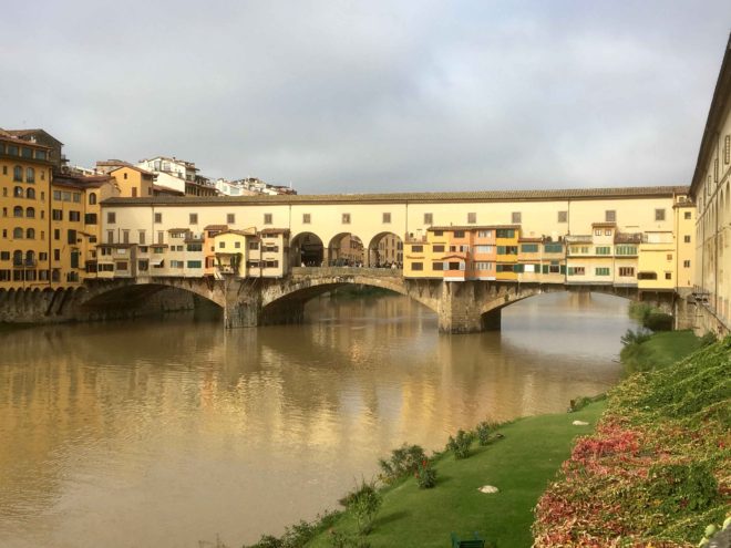 Ponte Vecchio, old bridge, from the East in the morning. Most shops are gold artisans.