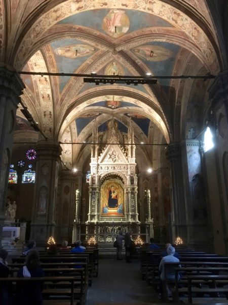 Church of Orsanmichele. First built in 893 as an oratory to San Michele in Orto, it became a granary. After several miracles were attributed to a picture of the Virgin Mary painted on one of the pillars, this church was built.