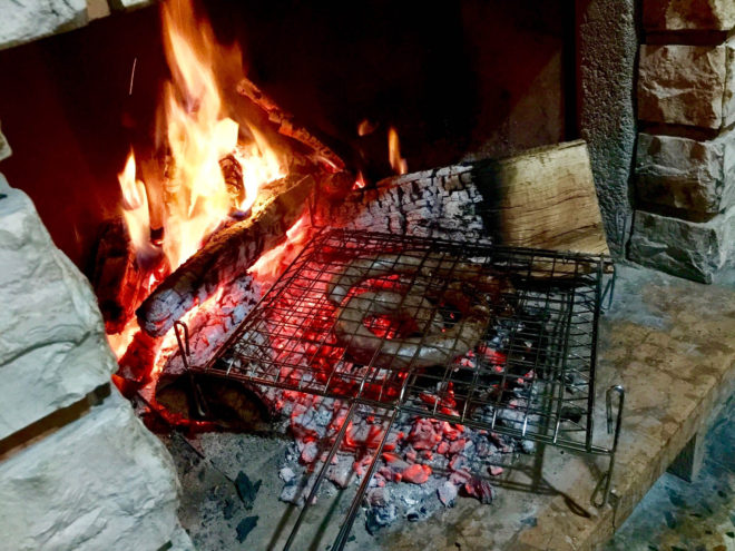 Second night home Adolfo and Gabriella fixed us up sausage cooked over the wood fire coals.