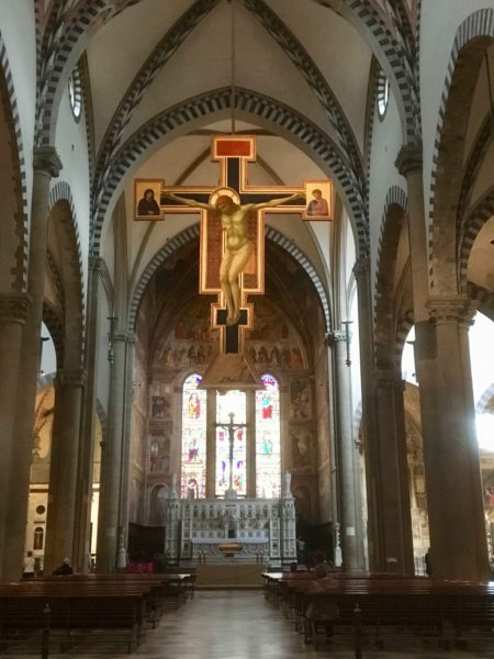 The Crucifix by Giotto hangs in the center of the central nave as all his crucifixes were intended. The empty air all around it reminds you of Christ's actual crucifixion on the wooden cross.