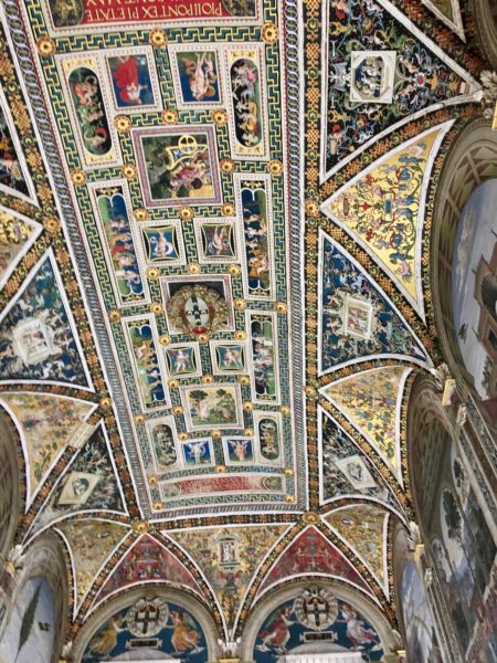 Ceiling of the Piccolomini Library which is entered from within the Basilica. We think it more beautiful than the Sistine Chapel although perhaps not as revered.