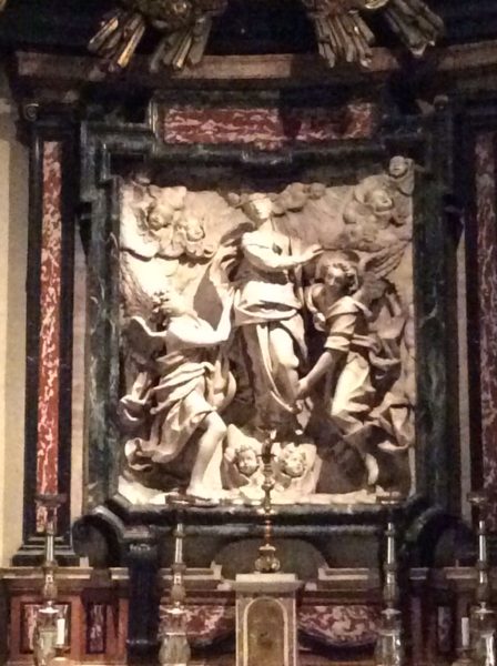 Close-up of a sculpture over the altar in one of the chapels in the Chiesa di San Vittore al Corpo, next to the da Vinci museum.