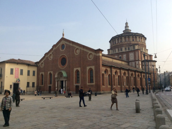 Church of Santa Maria delle Grazie where the Cenecolo or Last Supper is displayed. Entrance to the former Dominican dining room where the painting is located is thru the door in the yellow building on the left.