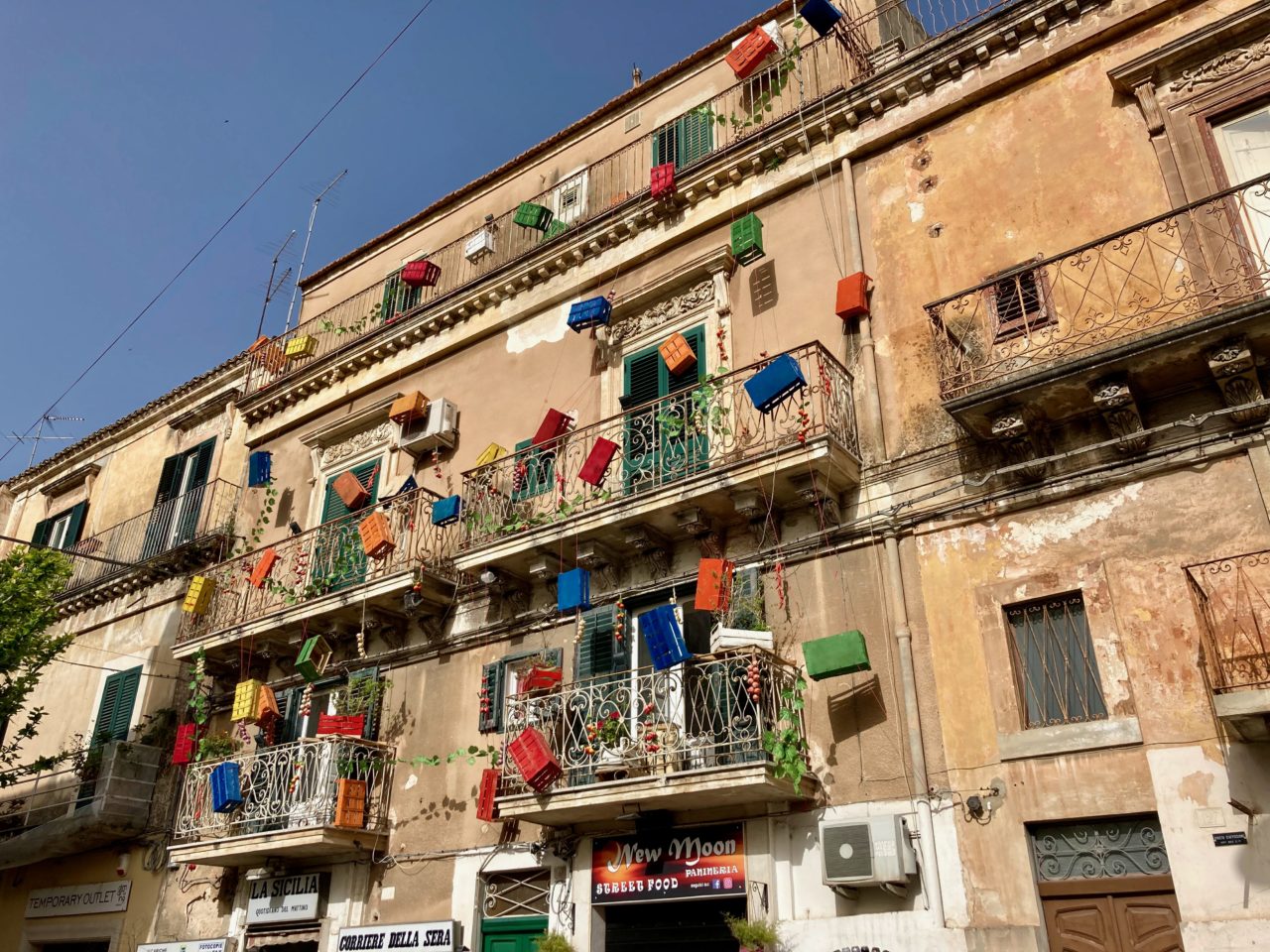 colored boxes on building